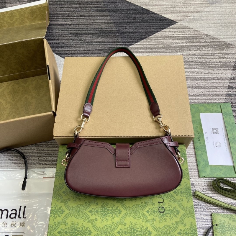 G*u*i top handle bags